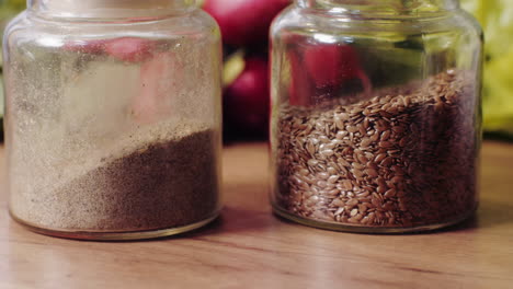 glass jars with spices and flax seeds