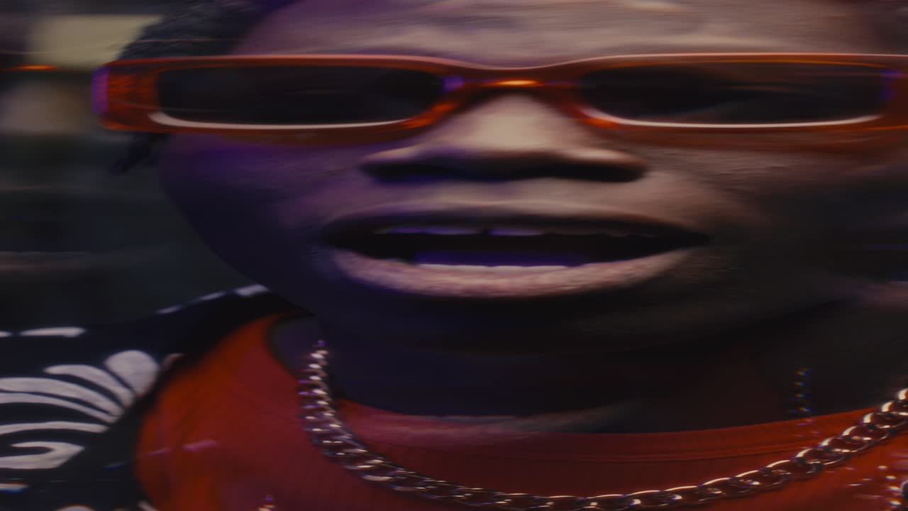 Kaleidoscopic Effect of African American Singer Performing Rap on Camera