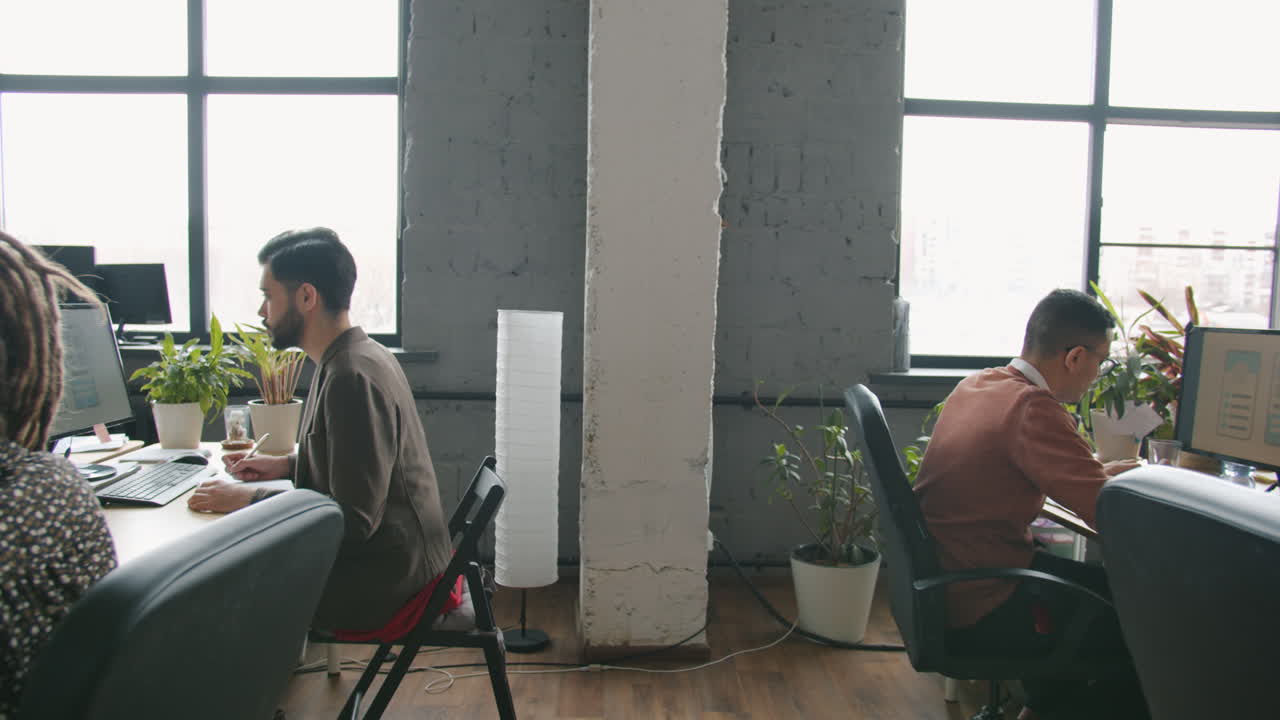 Coworkers Working in a Modern Office