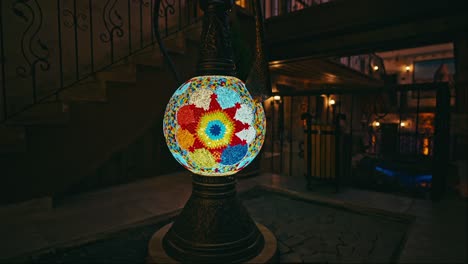 Colorful-stained-glass-lamp-mosaic-on-dark-background