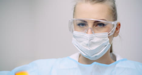 doctor measuring patient temperature at health care clinic 5