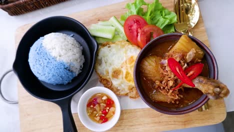 a traditional thai dish with rice and curry