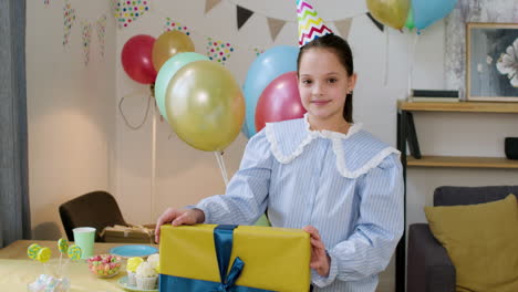 Girl-with-party-hat-posing