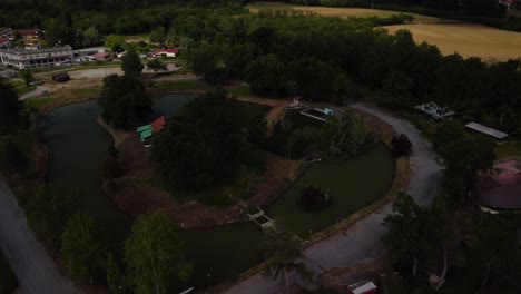 Abandoned-ghosted-Amusement-Park,-Greenland-Luna-Park,-Limbiate,-aerial-view