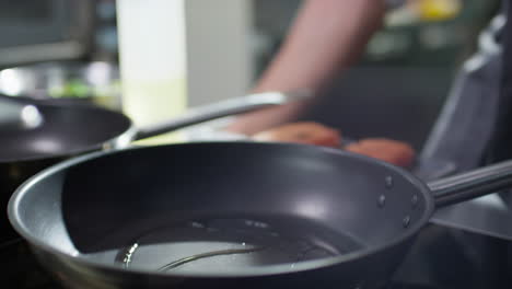 preparing fish fillet on frying pan