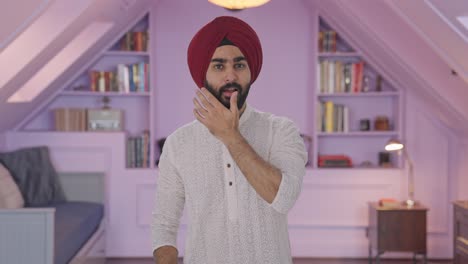 happy sikh indian man getting ready to go out