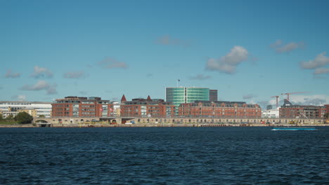 scenic waterfront skyline of copenhagen on a sunny day. ideal for travel promos or architectural documentaries.