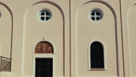 ornate facade of a church in a greek island