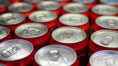 close-up of red soda cans