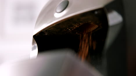 a coffee grinder grinds coffee