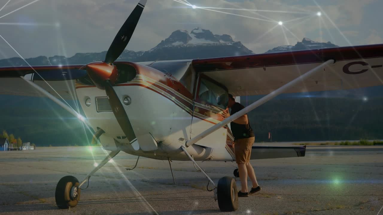 Man approaching right preflighting, boarding while lens flares and net lines brightening aviation