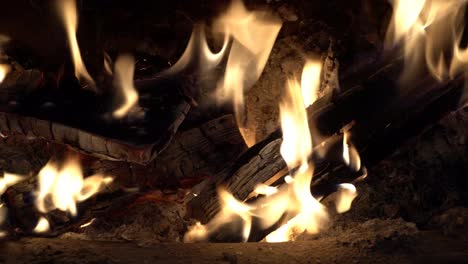 logs burning in wood burning stove. uk