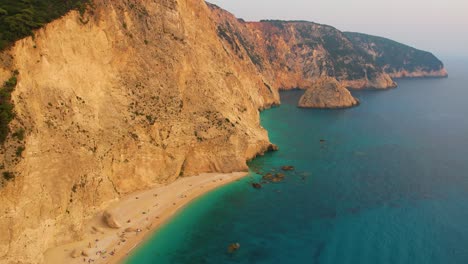 Aerial-View-Along-Coastline-High-Cliffs-At-Porto-Katsiki-Beach-At-Lefkada-Island-Greece