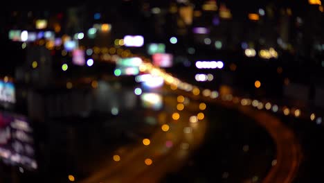 abstract blur bokeh of city night traffic lights background. bangkok thailand. city noise. 4k resolution.
