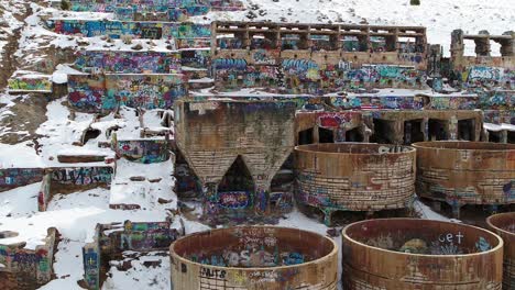 a drone shot of the old tintic mill in genola, utah, captures the water and leaching tanks as well as the roasters, built in the 1920s