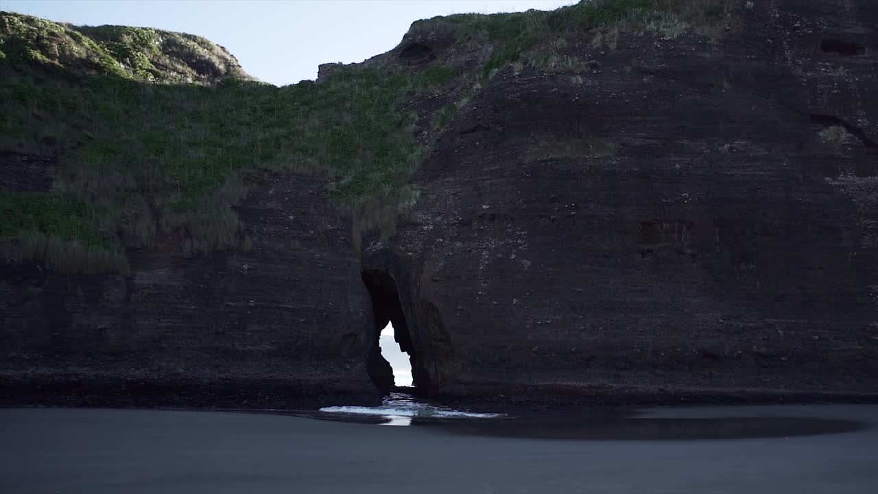 Coastal Landscape with Rock Formation and Beach