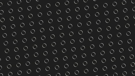 circular black and white pattern with repeated small dots