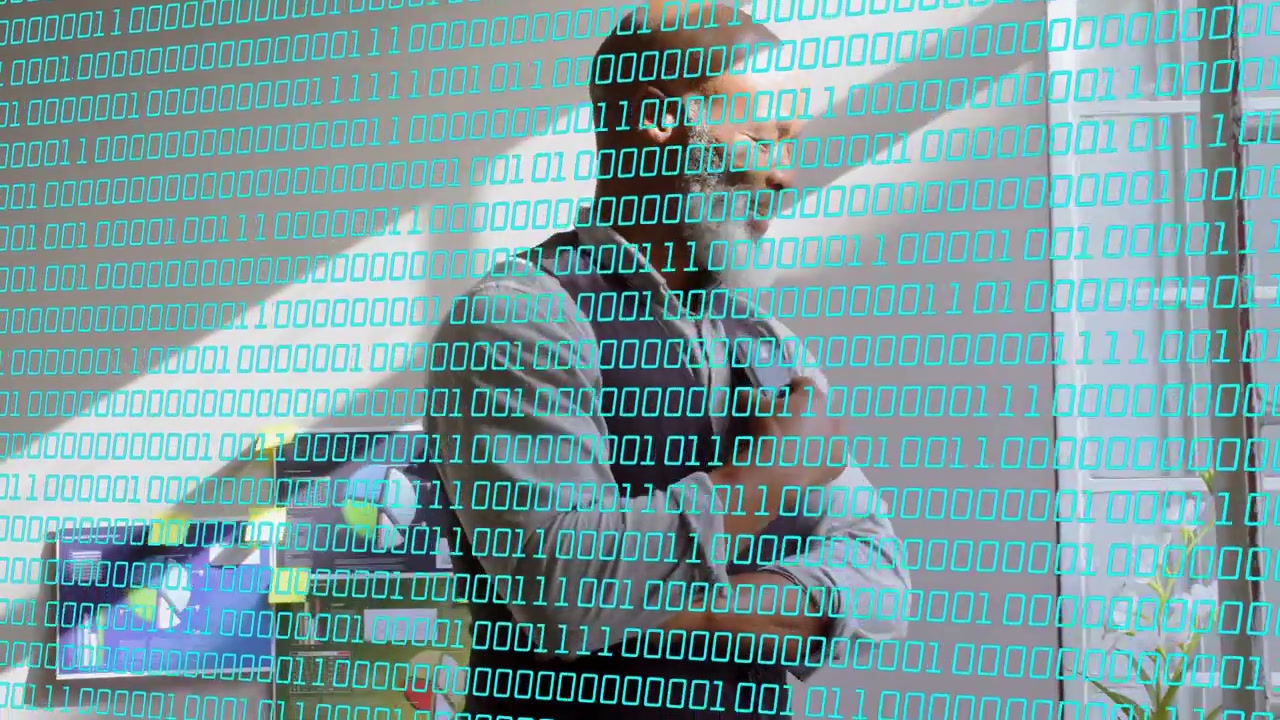 Mature man tapping remote, shifting gaze to monitor, gesturing while presenting binary data overlay