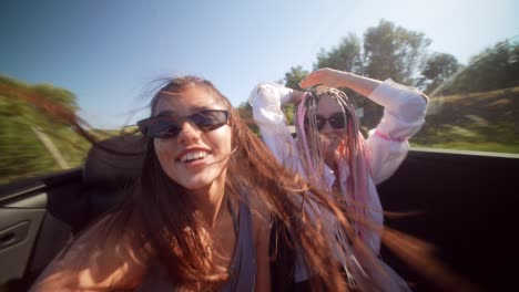 joyful summer road trip in a convertible