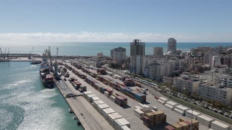 Aerial:-Containers-loaded-onto-freight-ship-in-Albanian-Durres-Port