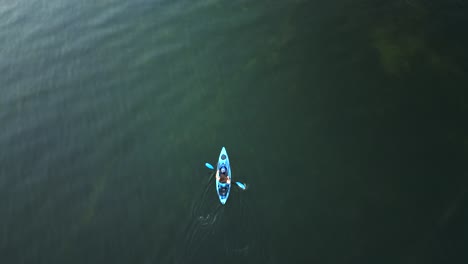 aerial view of a kayaker in a beautiful lake in oregon