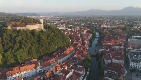 sunrise over ljubljana castle in slovenia