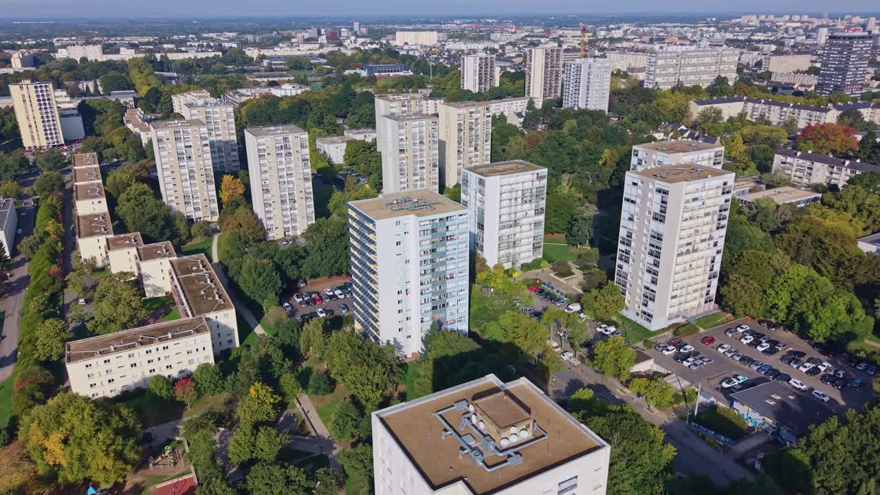 Aerial of modern apartment blocks in Henri Fréville district, Rennes, France, panoramic establishing dolly