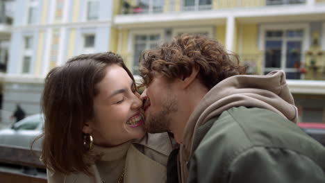 happy couple laughing on romantic date. man and woman felling happy outdoor.