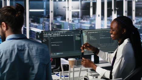data center coworkers having fun in office, using ai