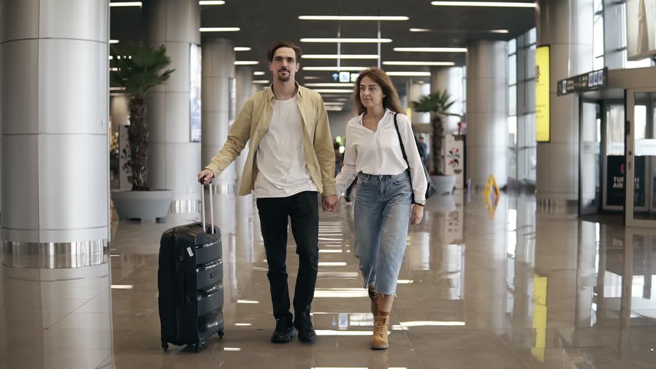Free stock video - Front view of smiling couple walking together in ...