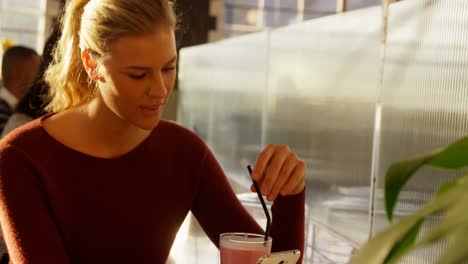 beautiful woman having milkshake 4k