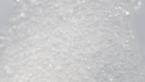 Frozen water molecules in ice.