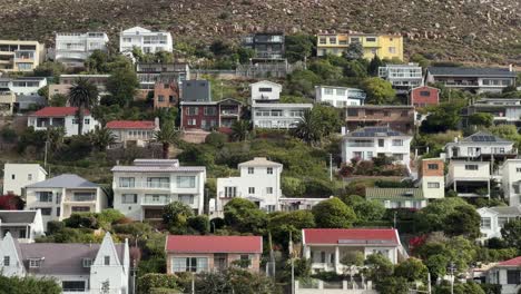 a view from the mountains in cape town at a beach in fish hoek.