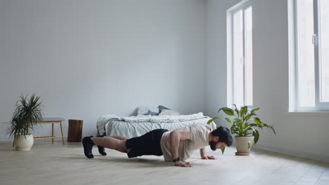 man doing push-ups at home