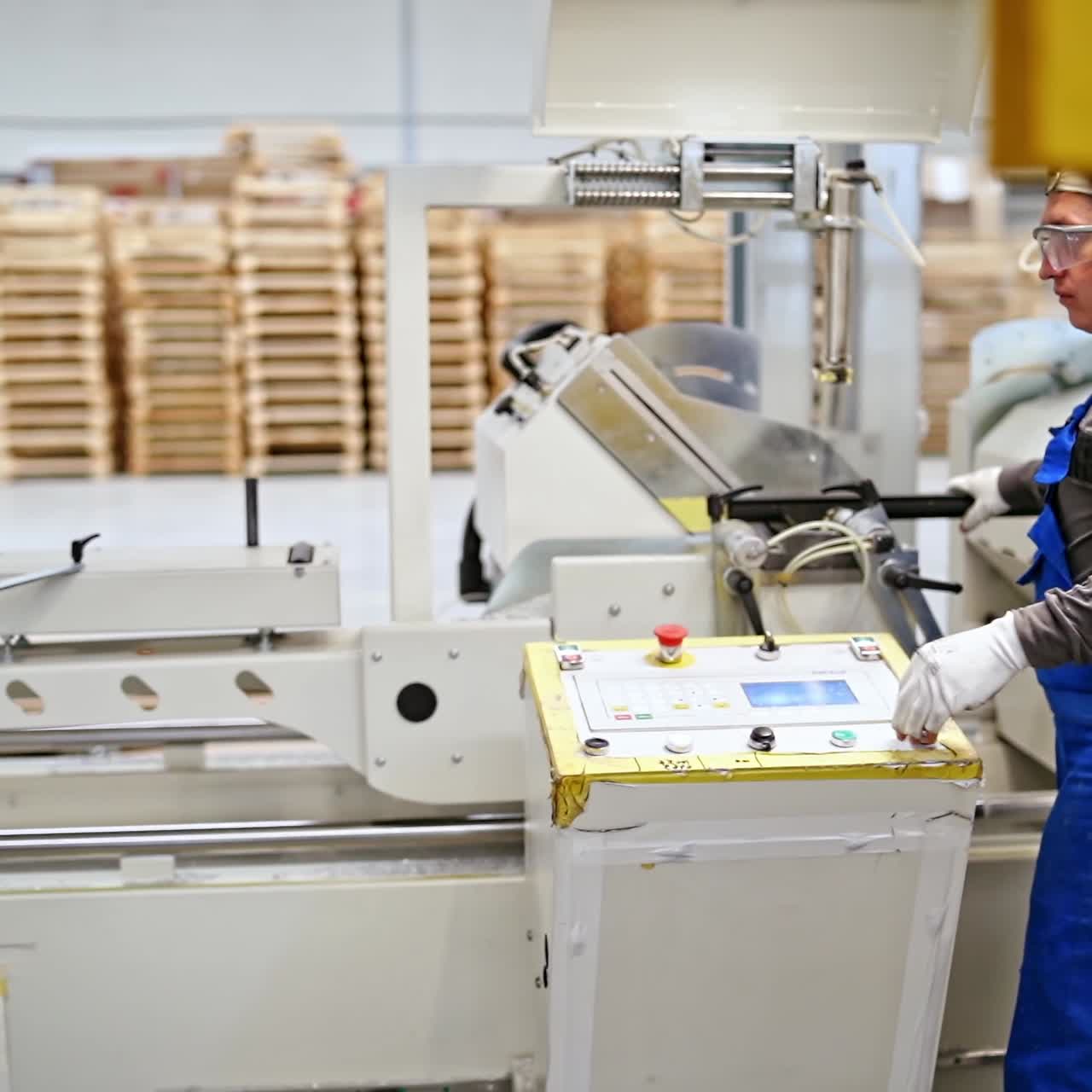 Worker operating in industrial factory
