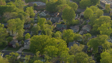 flyover houses in the suburbs towards a highway at sunset