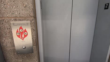 point of view, time-lapse of doors opening entering an elevator pressing the button and doors closing.