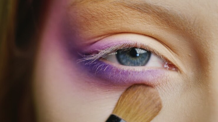 Apply Makeup On A Beautiful Female Eye Of Blue Color