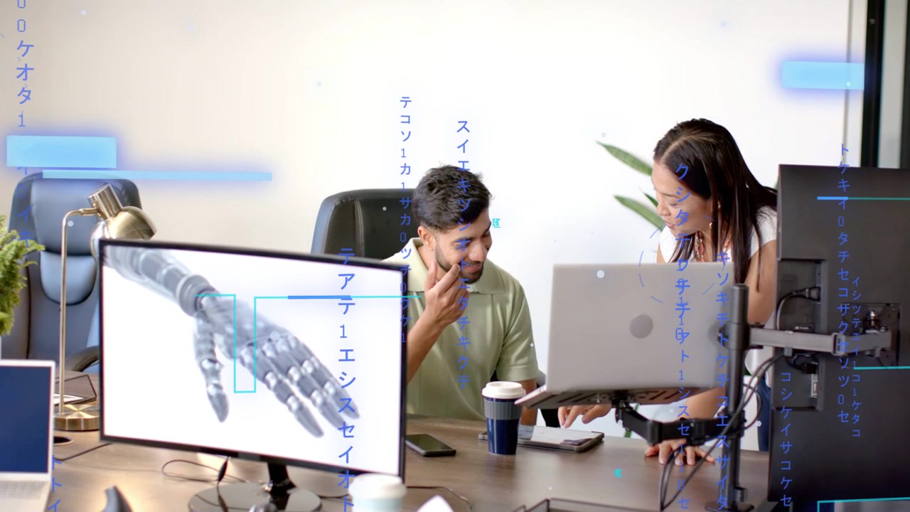 Woman leaning laptop to man, reviewing prosthetic hand render while overlays appearing on monitor
