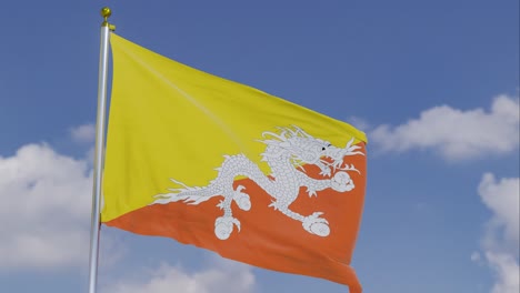 Flag-Of-Bhutan-Moving-In-The-Wind-With-A-Clear-Blue-Sky-In-The-Background,-Clouds-Slowly-Moving,-Flagpole,-Slow-Motion