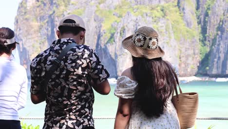 people taking photos of a beautiful seascape