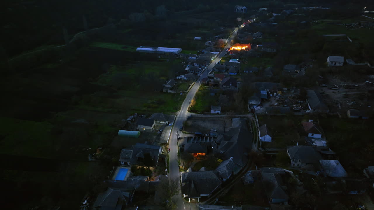 Aerial drone view of the houses in Trebujeni, near the Old Orhei historical and archaeological complex in Moldova in the evening