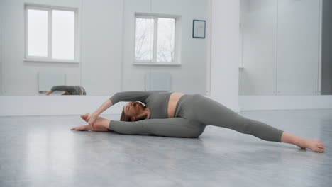 yoga and stretching poses in a studio