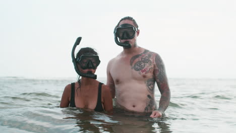 couple with diving goggles on