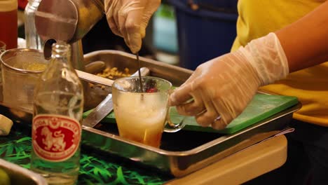 sequential preparation of a refreshing honey lemon soda.