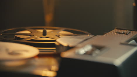 reel to reel tape spinning on desk