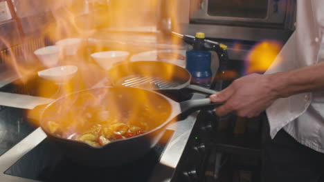 cooking vegetables on fire