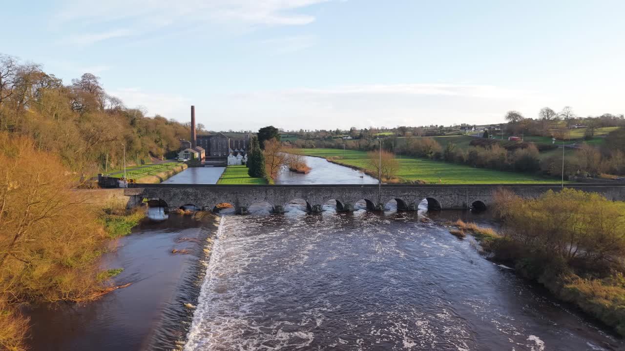 Weir At Boyne River With Slane Bridge In County Meath, Ireland. - aerial shot