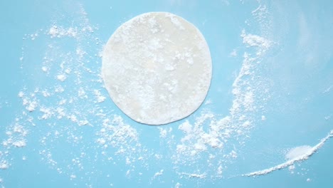 preparing dough for dumplings or other pastries
