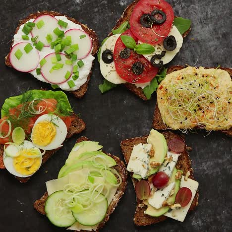 healthy vegan sandwiches made from homemade buckwheat bread with various toppings